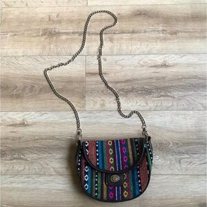 Beautiful woven Himalayan cross body purse with removable chain strap .